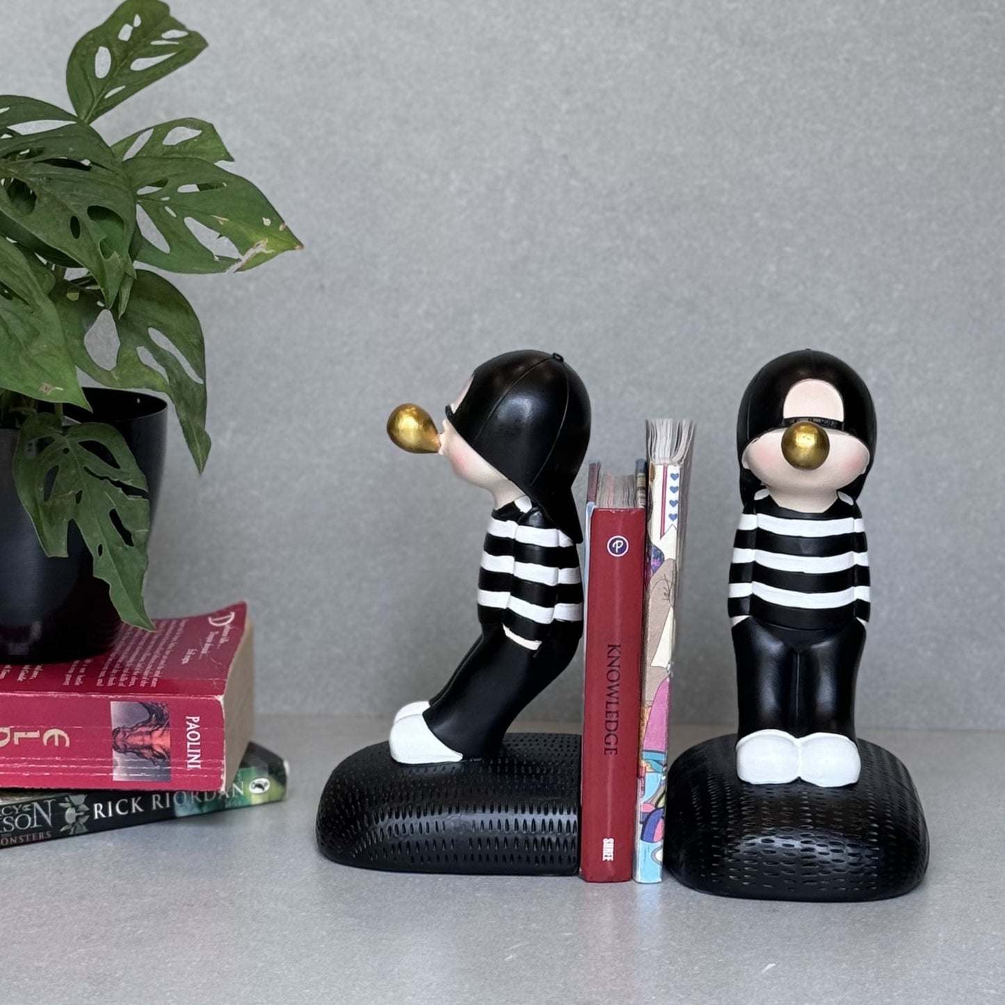 Cute Boy Blowing Bookend