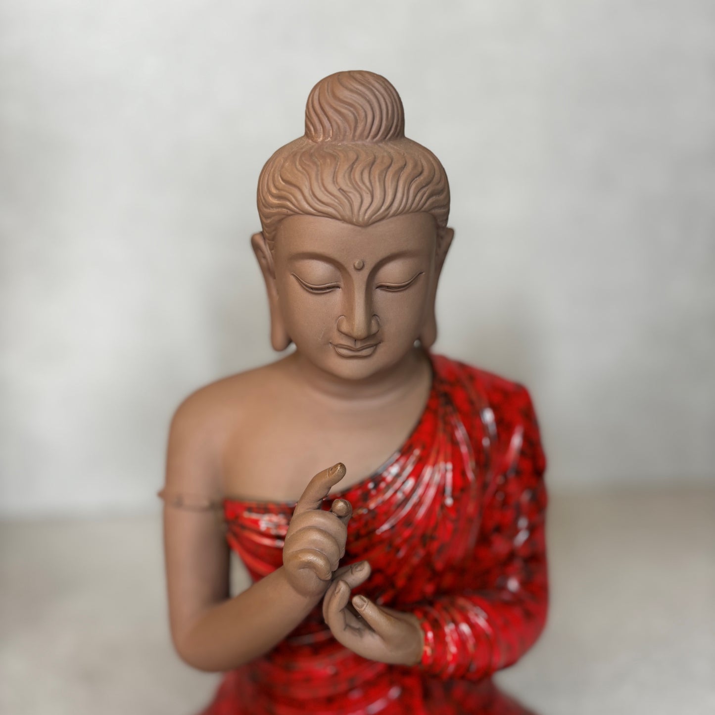 Porcelain Sitting Buddha Sculpture