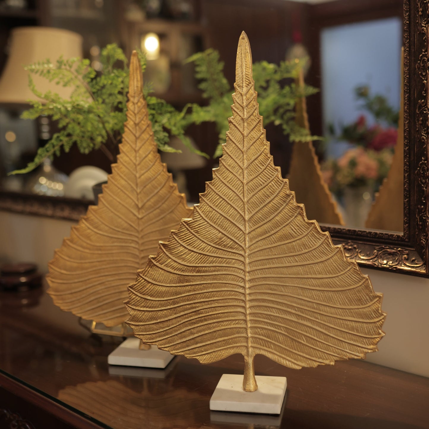 Gold metal leaf on Marble base