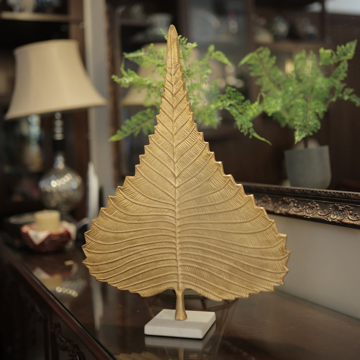 Gold metal leaf on Marble base