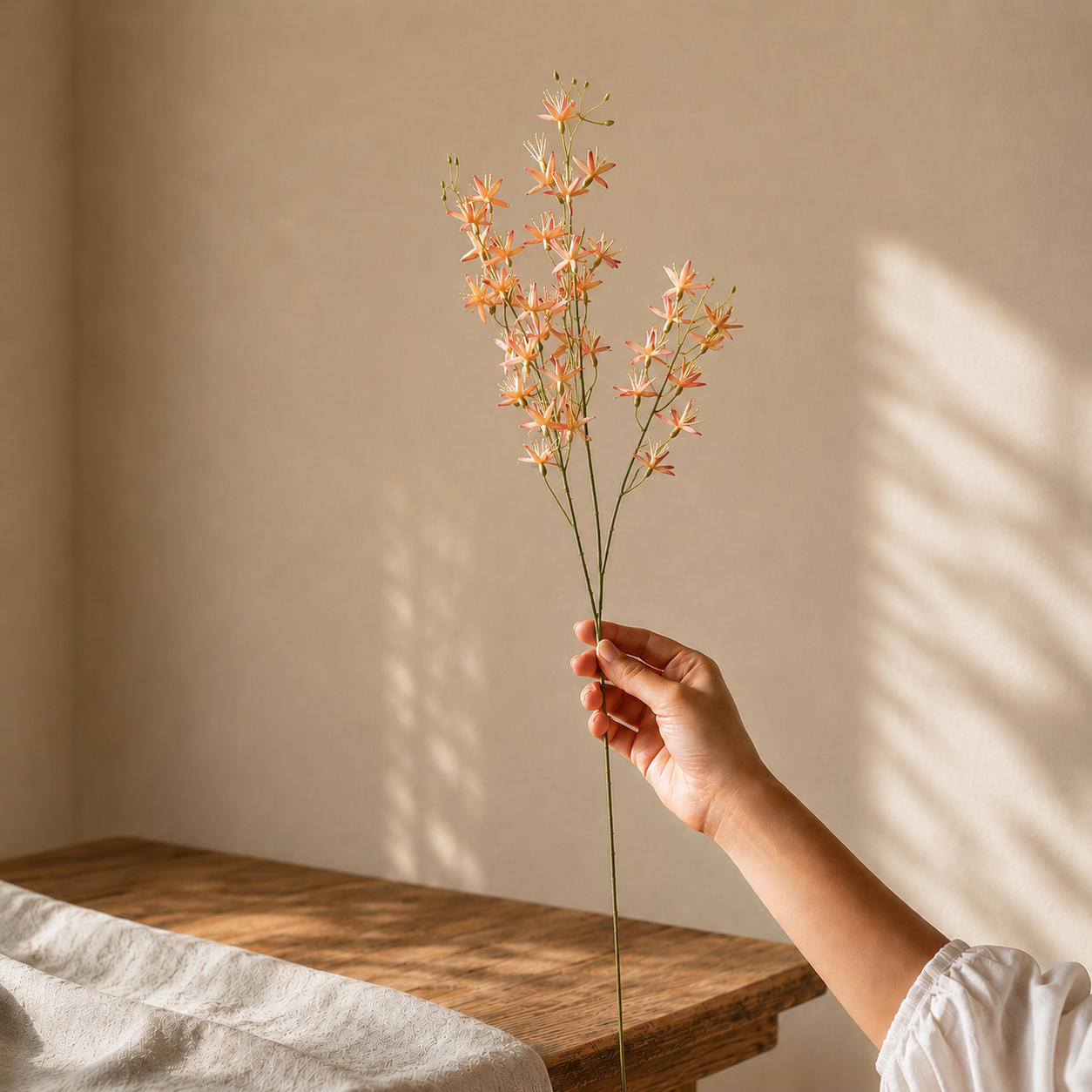 Artificial peach wildflower stem with realistic blossoms, premium faux floral branch for elegant vase arrangements and luxury home décor.