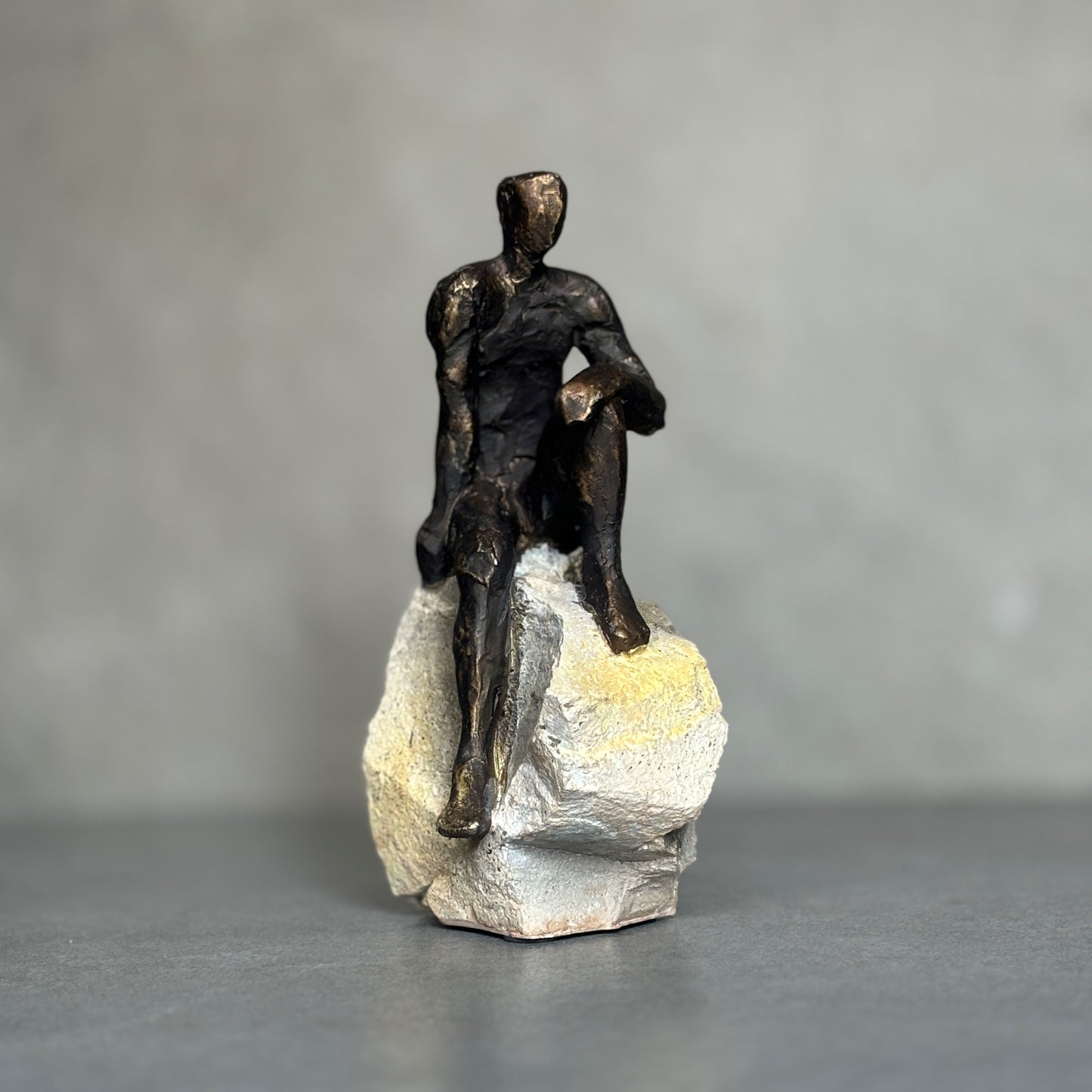 Sitting Bronze Man Sculpture