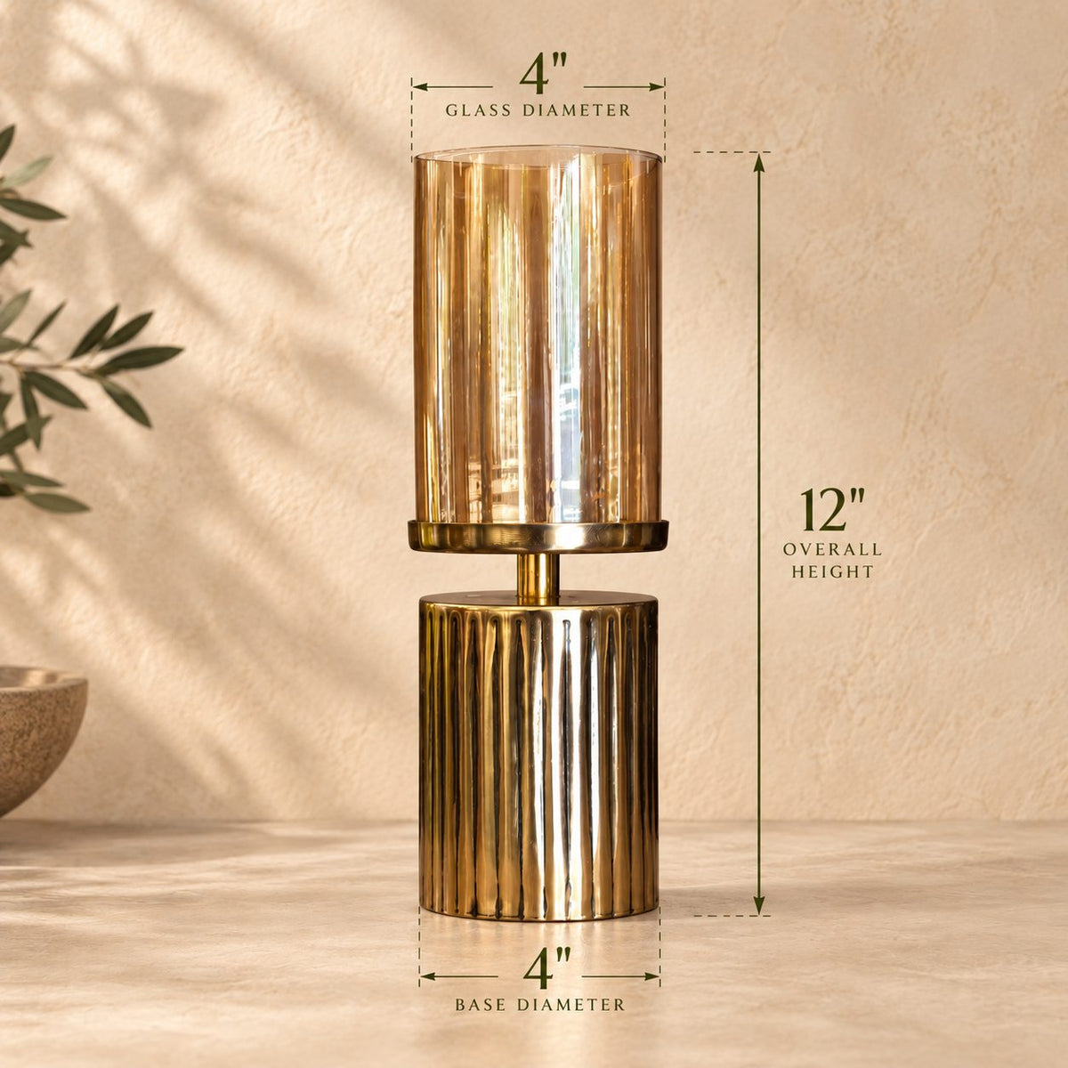 Dimensions infographic of the amber glass hurricane candle holder showing 12-inch overall height with 4-inch glass and base diameter.