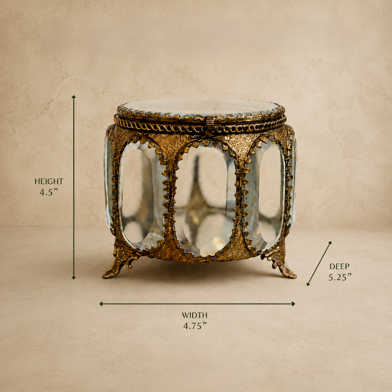Dimensions of the Antique Brass and Glass Trinket Box showing 4.5-inch height, 4.75-inch width, and 5.25-inch depth by Inara Home Decor.