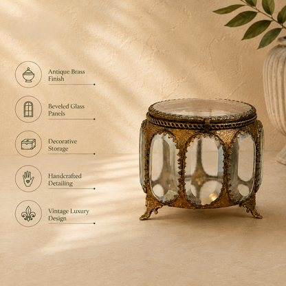 Antique brass and glass trinket box featuring beveled glass panels, handcrafted detailing, decorative storage, and vintage luxury design.