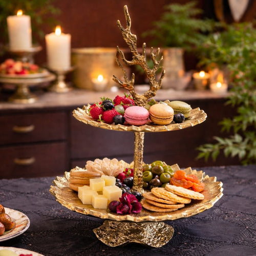Antique Gold Brass 2 Tier Stand – It's time to turn up the elegance at your next dinner party with this elegant 2-tier stand which elevates | INARA