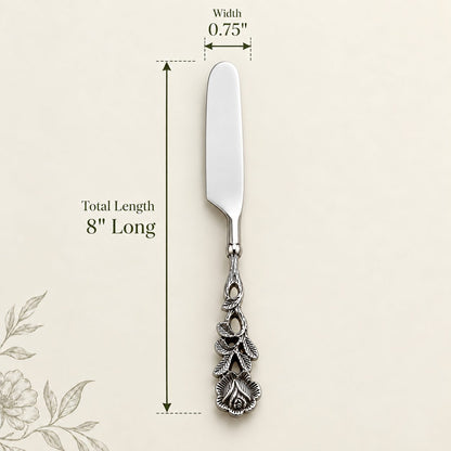 Antique silver floral handle butter knife with ornate vintage design showing dimensions of 8 inches long and 0.75 inch wide. Premium stainless steel serving knife by Inara Home Decor, ideal for butter, desserts, and elegant table settings.
