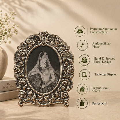 Florence Heirloom oval photo frame with feature icons: aluminium build, antique silver finish, hand-embossed florals.