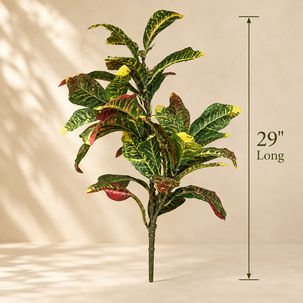 Artificial Croton foliage bunch measuring 29 inches long with realistic multicoloured variegated leaves.