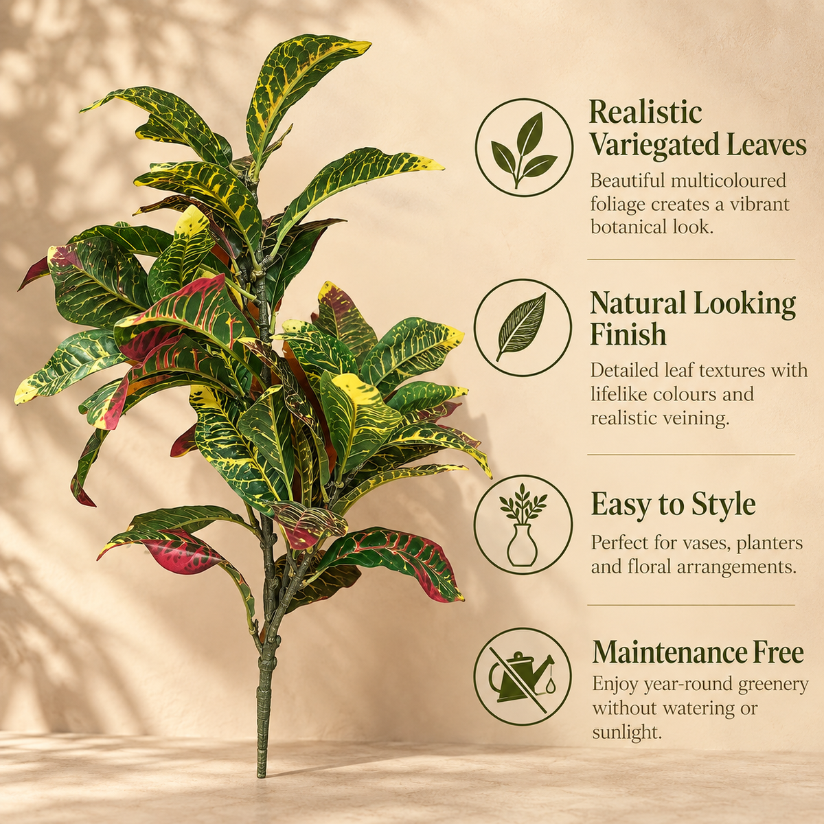 Features infographic of Artificial Croton foliage bunch highlighting realistic variegated leaves, natural finish, easy styling and maintenance-free greenery.