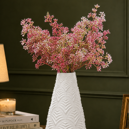Artificial Pink Star Cluster Stem arranged in a white textured vase, creating an elegant luxury home décor display.
