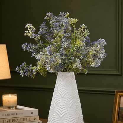 Artificial Faux Fillers Lavender stems arranged in a white textured vase, adding elegant purple floral décor to a modern luxury living room.