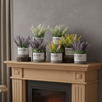 Collection of artificial flowering plants in decorative ceramic pots displayed on a wooden mantel, featuring white, yellow, and lavender blooms for elegant home décor.