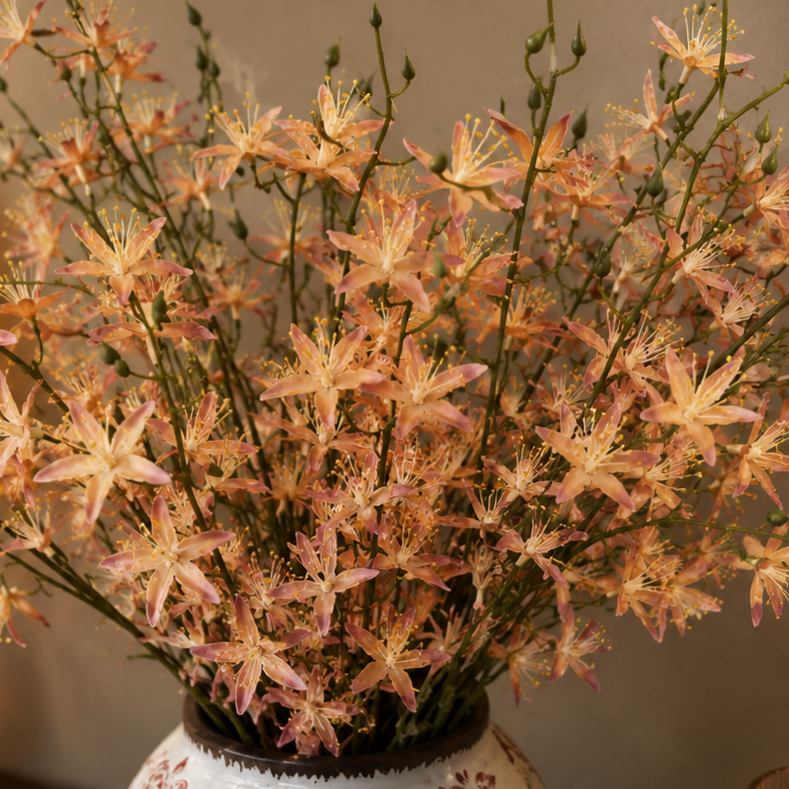 Close-up of artificial peach wildflowers featuring realistic petals and buds, ideal for premium floral arrangements and home decoration.