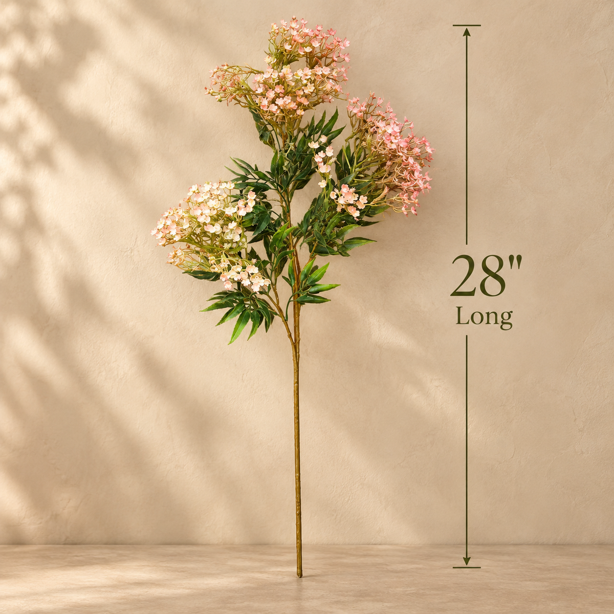 Dimensions of the artificial pink blossom flower stem measuring 28 inches long.