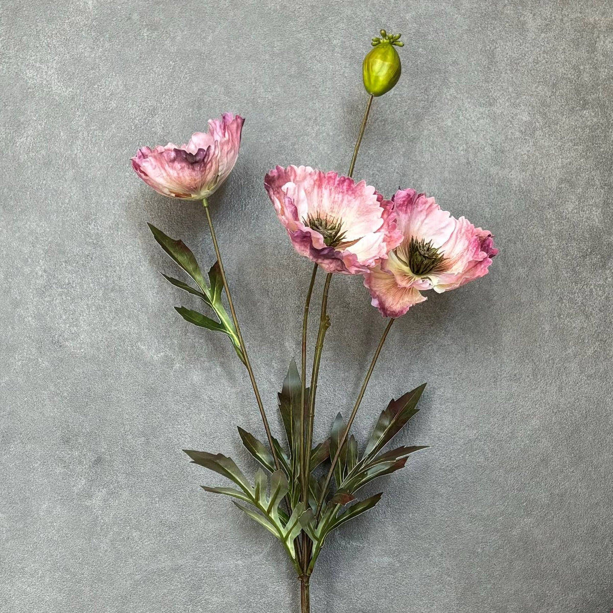 Single Artificial Poppy Pink stem with three blooms and one bud for floral arrangements.