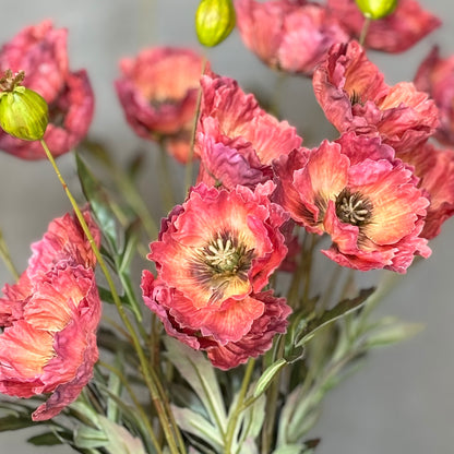 Close-up of realistic Artificial Poppy Red flowers crafted from premium PU and silk.