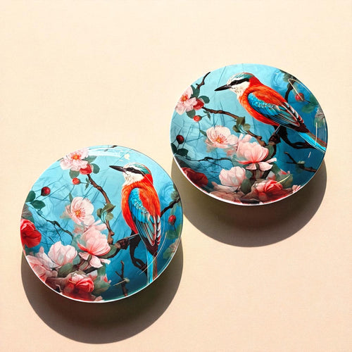 Bird Ceramic Wall Plate – Set against a serene blue tropical backdrop, the vibrant kingfisher perched on a twine brings this ceramic | INARA