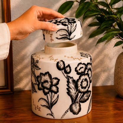 Black and white hand-painted ceramic ginger jar with removable lid, decorative floral storage jar for luxury home décor by Inara Home Decor.