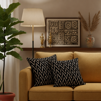 Black Zig Zag Velvet Cushion Covers styled on a mustard sofa in a modern living room, showcasing the textured woven pattern and luxury home décor aesthetic.