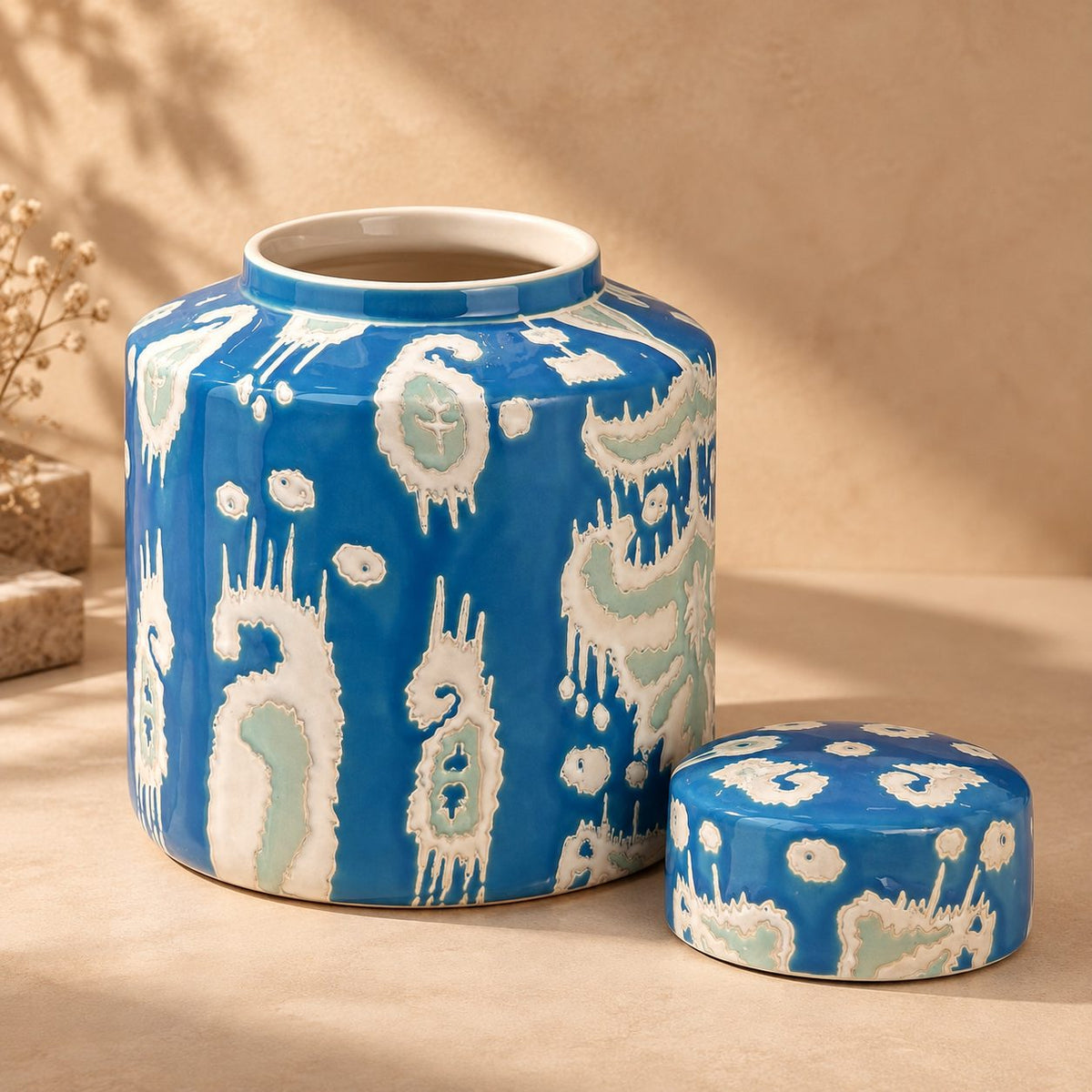 Premium blue ceramic decorative jar with removable lid, handcrafted glazed finish for elegant home décor.