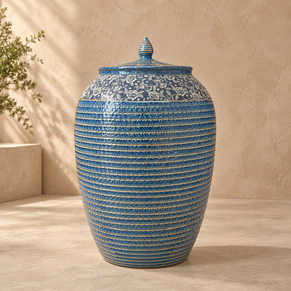 Luxury handcrafted blue floral ceramic decorative storage jar with lid for elegant home décor and stylish storage.