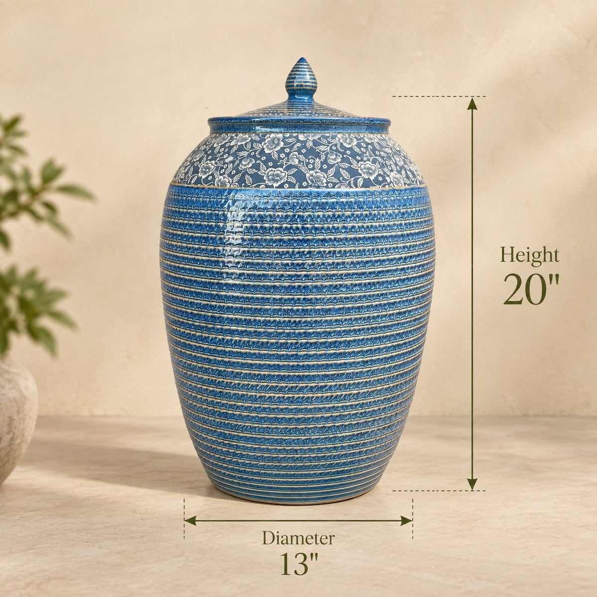Dimensions infographic of the blue floral ceramic decorative storage jar measuring 20 inches in height and 13 inches in diameter.