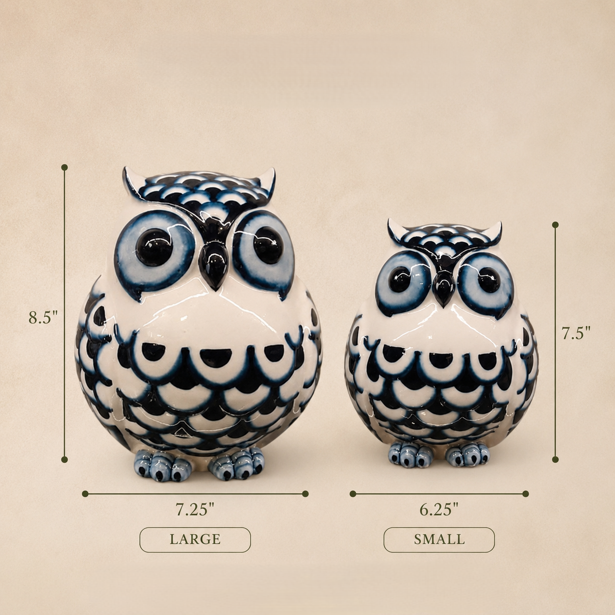 Dimensions guide for Inara Home Decor blue and white ceramic owl figurines showing the large owl measuring 8.5 inches high × 7.25 inches wide and the small owl measuring 7.5 inches high × 6.25 inches wide on a warm beige background.