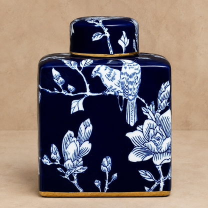 Blue and white hand-painted ceramic ginger jar with floral and bird design, decorative luxury home décor accent with glossy finish.