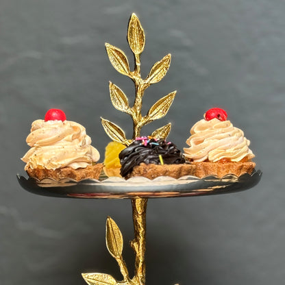 Luxury tabletop accessory with aluminum cast brass plating on leaf details.