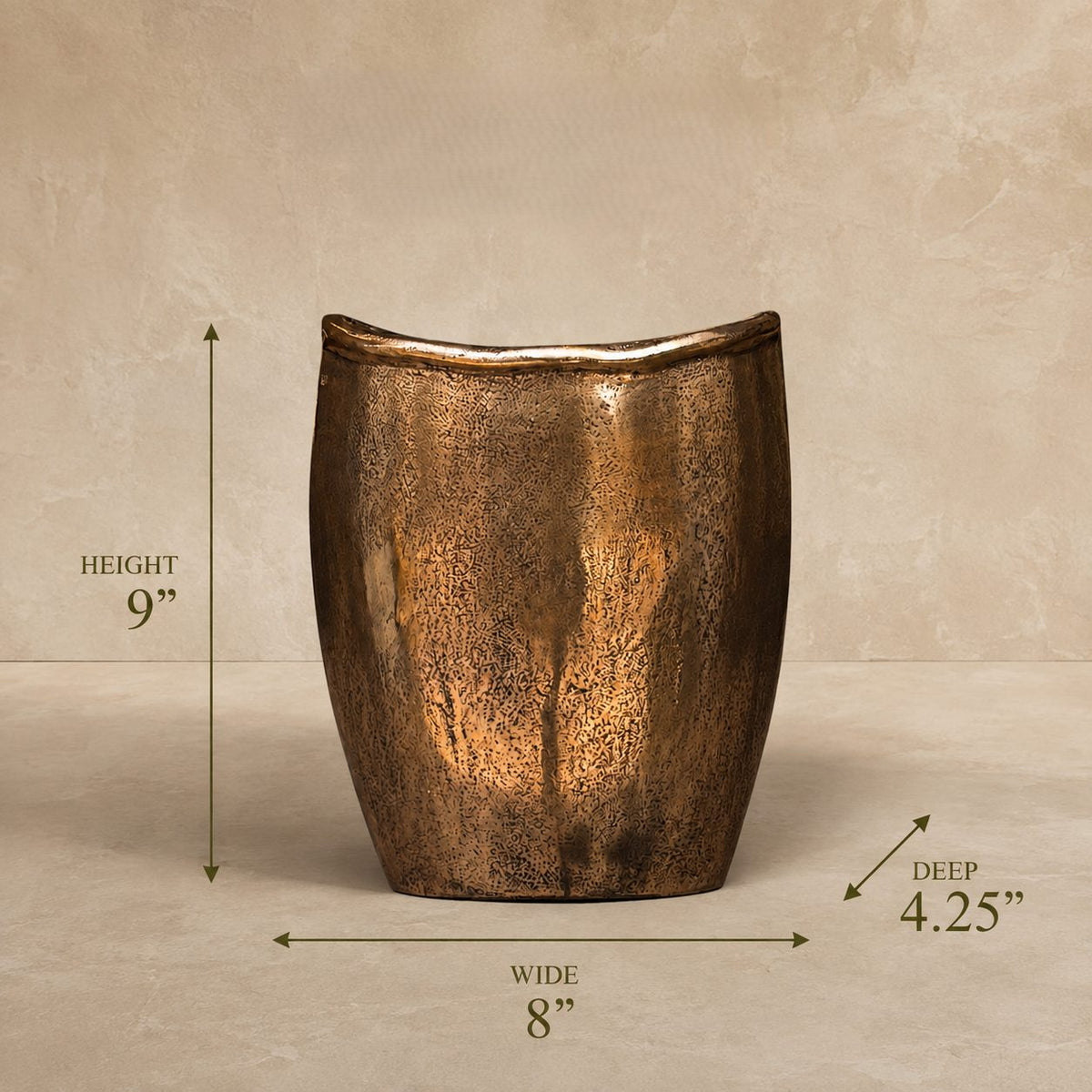 Antique bronze handcrafted metal decorative vase dimensions – 9 inches high, 8 inches wide and 4.25 inches deep.