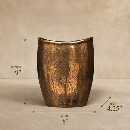Antique bronze handcrafted metal decorative vase dimensions – 9 inches high, 8 inches wide and 4.25 inches deep.