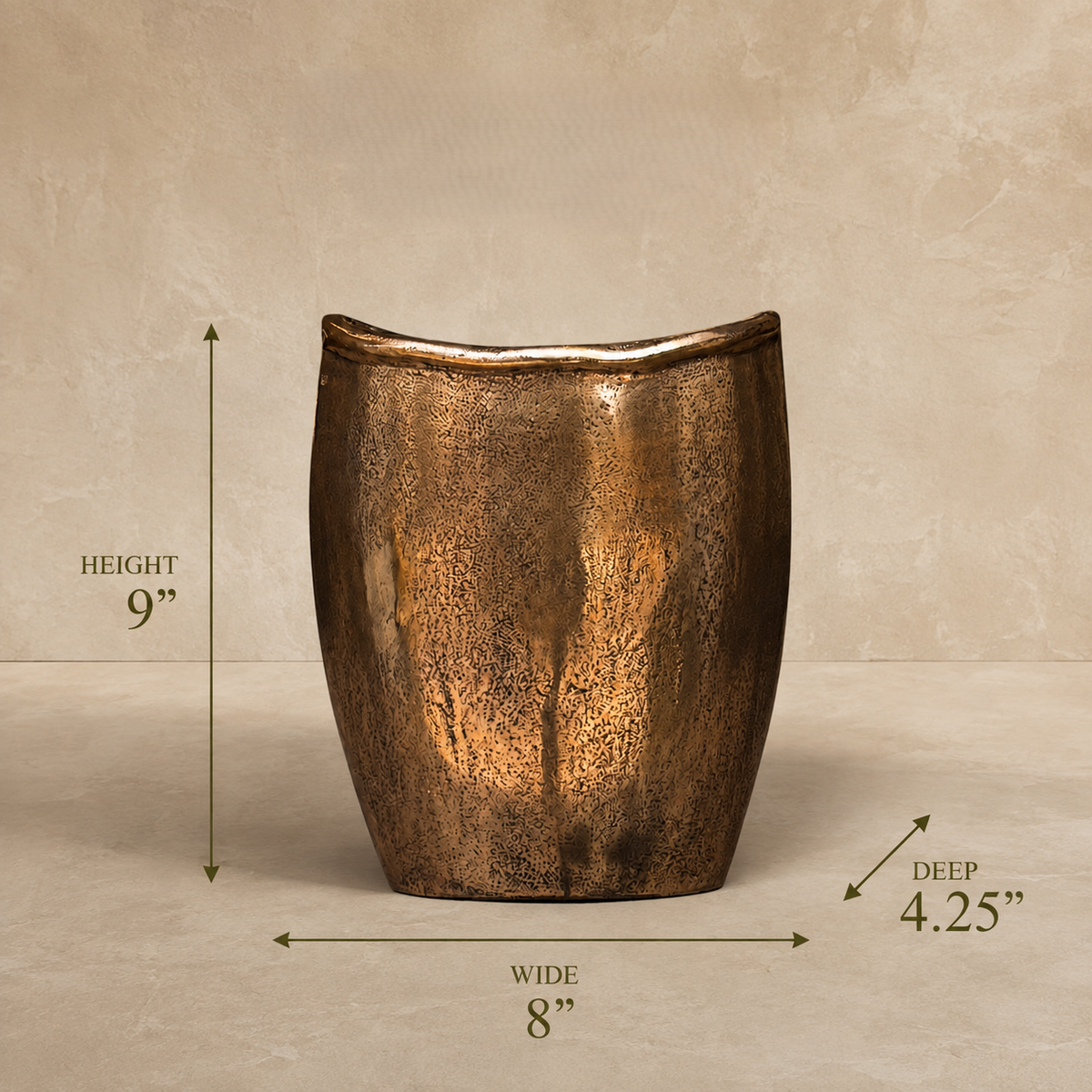 Antique bronze handcrafted metal decorative vase dimensions – 9 inches high, 8 inches wide and 4.25 inches deep.