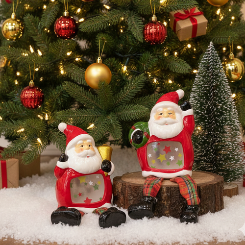 Christmas Decoration Santa Pair – These charming santa clauses with hanging legs add a playful and unique element to your seasonal decorations | INARA