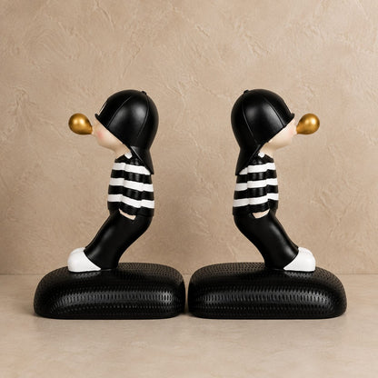Boy and girl bookend set, black and white striped design with gold bubble accent