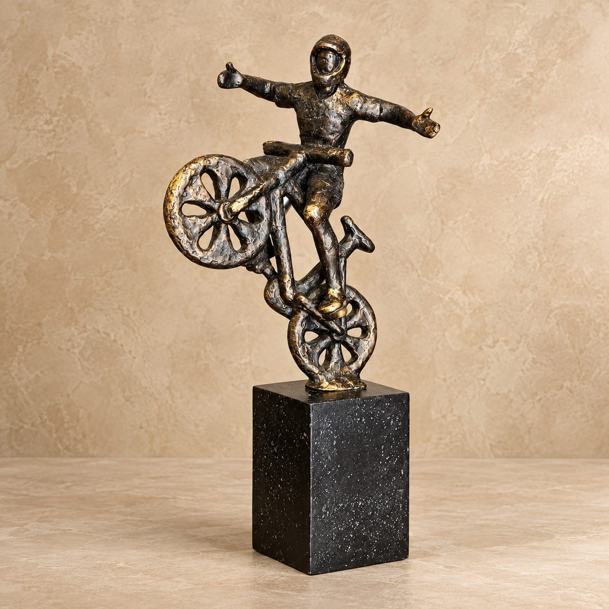 Premium resin cyclist balancing bike sculpture on a black pedestal, modern luxury home décor accent for living room, bedroom, office and bookshelf.