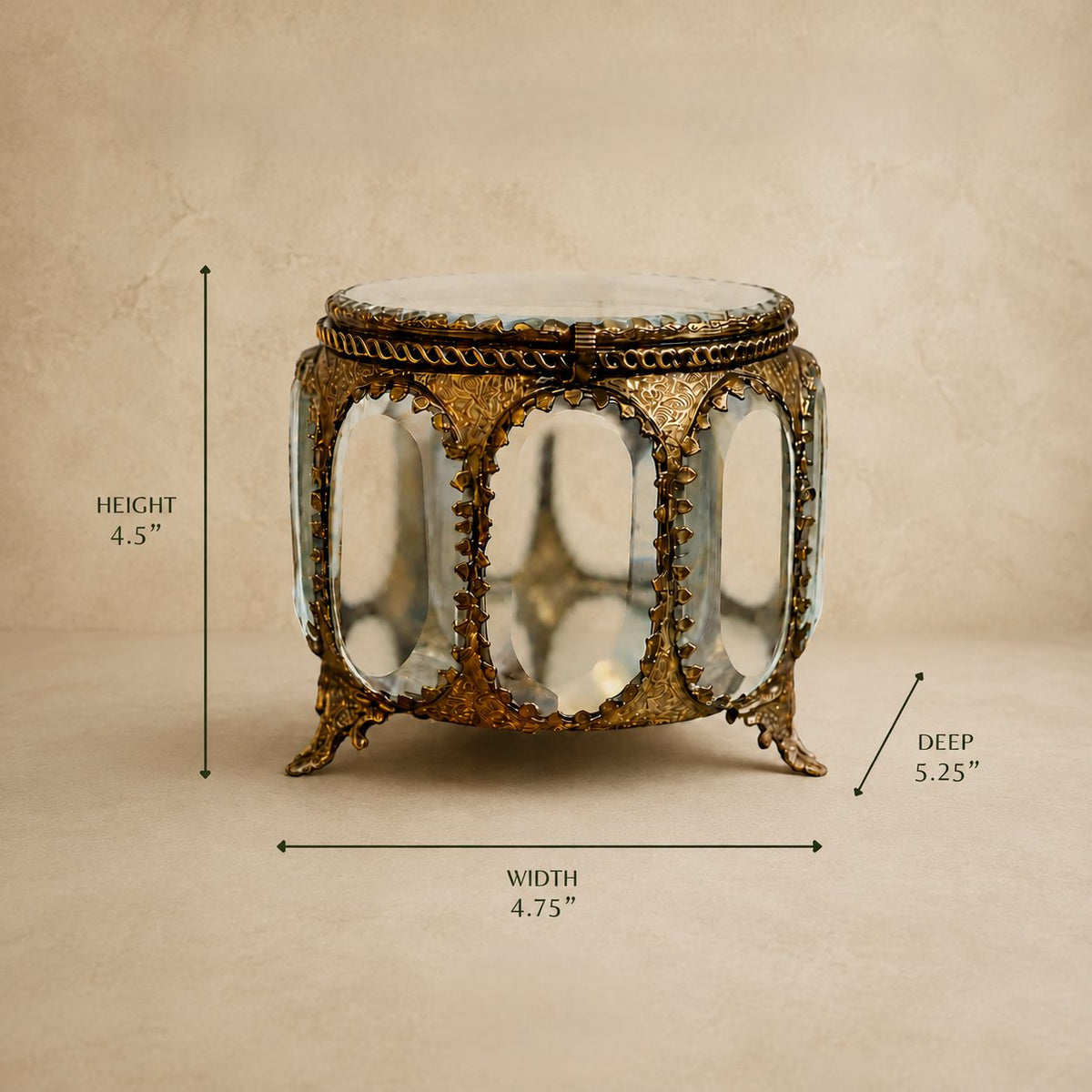 Dimensions of the Antique Brass and Glass Trinket Box showing 4.5-inch height, 4.75-inch width, and 5.25-inch depth by Inara Home Decor.