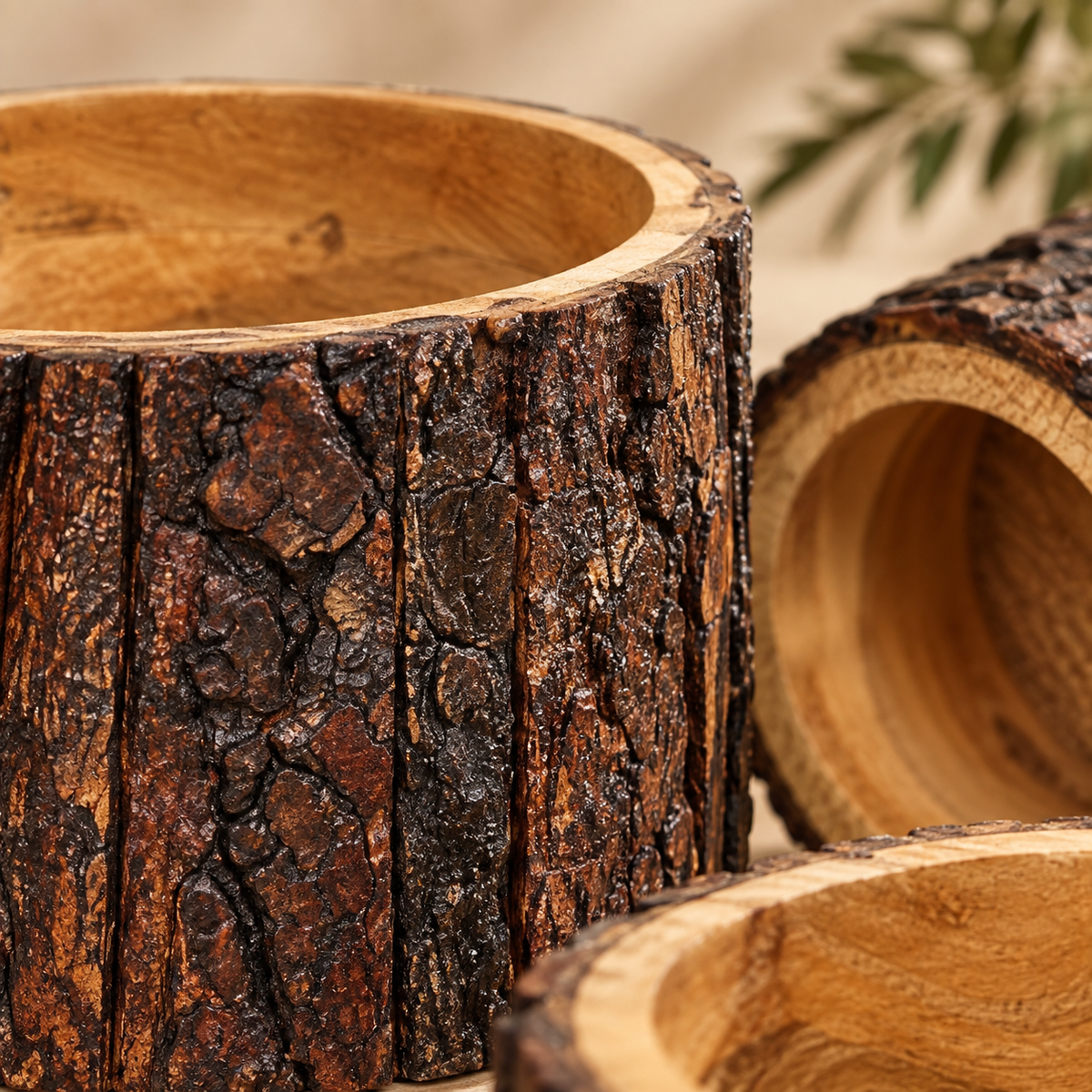 Close-up of handcrafted Drift Wood Planter made from mango wood with natural bark texture and rustic finish by Inara Home Decor.