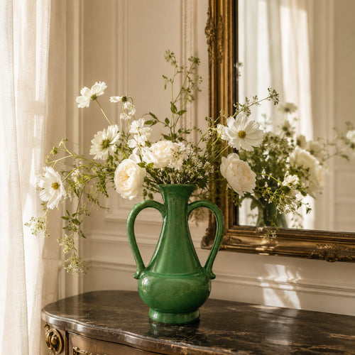 Emerald Crest Ceramic Vase With Handles – A striking expression of refined design, this emerald green ceramic vase features a rich, glossy | INARA