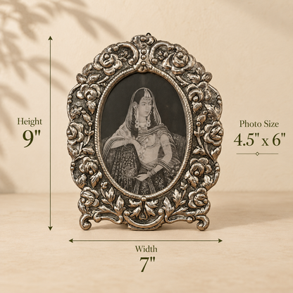 Dimensions of the Florence Heirloom antique silver oval photo frame measuring 9 inches high, 7 inches wide, suitable for a 4.5 x 6 inch photograph.