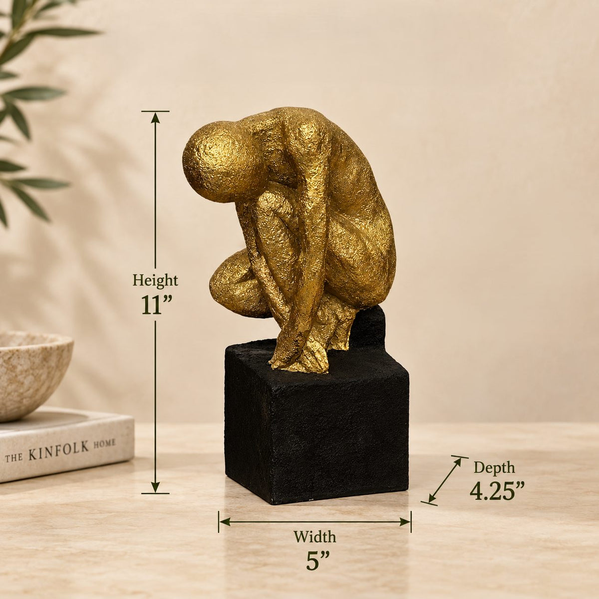 Dimensions of luxury gold abstract human sculpture measuring 11 inches high, 5 inches wide and 4.25 inches deep.