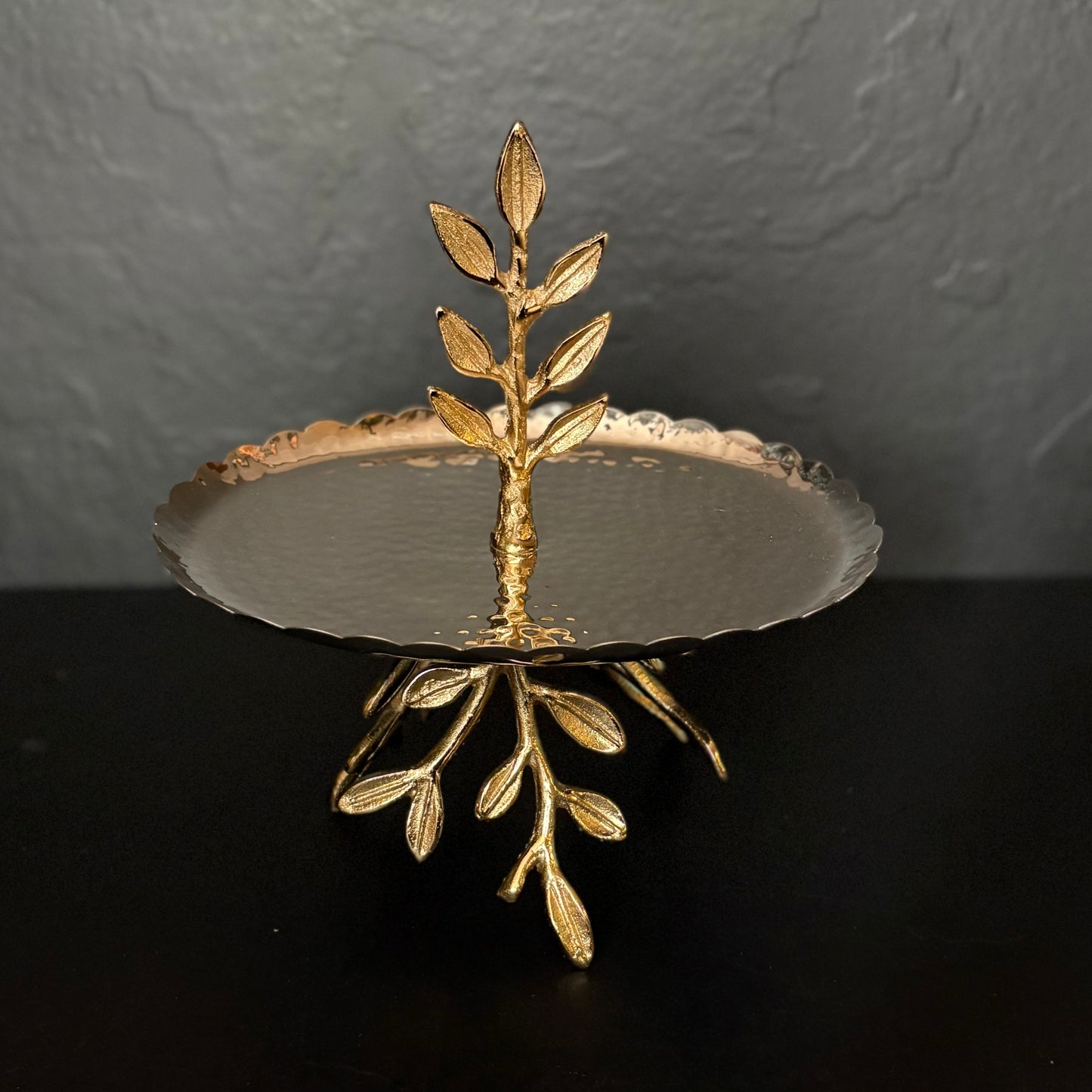 Elegant gold two tier dessert stand with leaf handle and scalloped trays