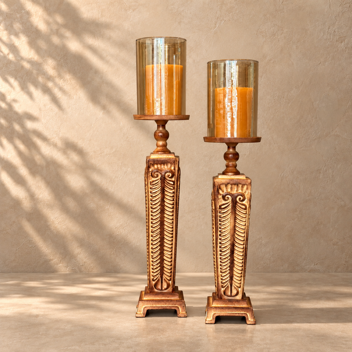 Hand-carved wooden hurricane candle holder set with antique bronze finish and glass hurricane shades, luxury home décor by Inara Home Decor.