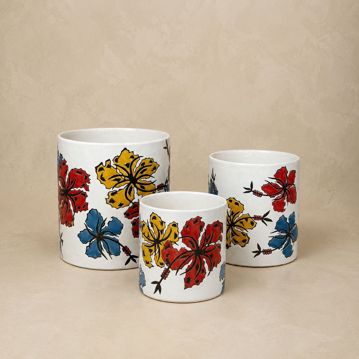 Hand-painted floral ceramic planter set of 3 in white with colorful hibiscus artwork, premium decorative indoor plant pots.