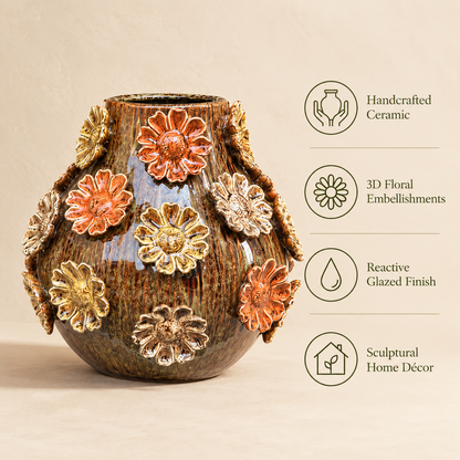 Handcrafted ceramic vase with 3D floral embellishments and reactive glazed finish.