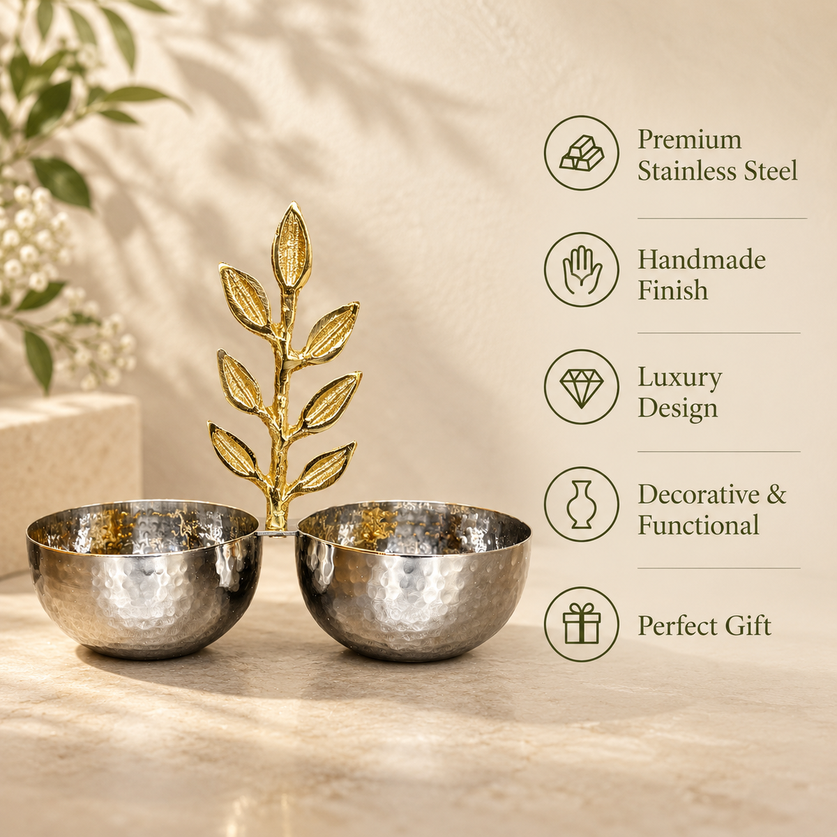Inara handmade hammered stainless steel twin bowl set connected by a decorative brass gold leaf handle, displaying key product features including luxury handmade finish and premium design.