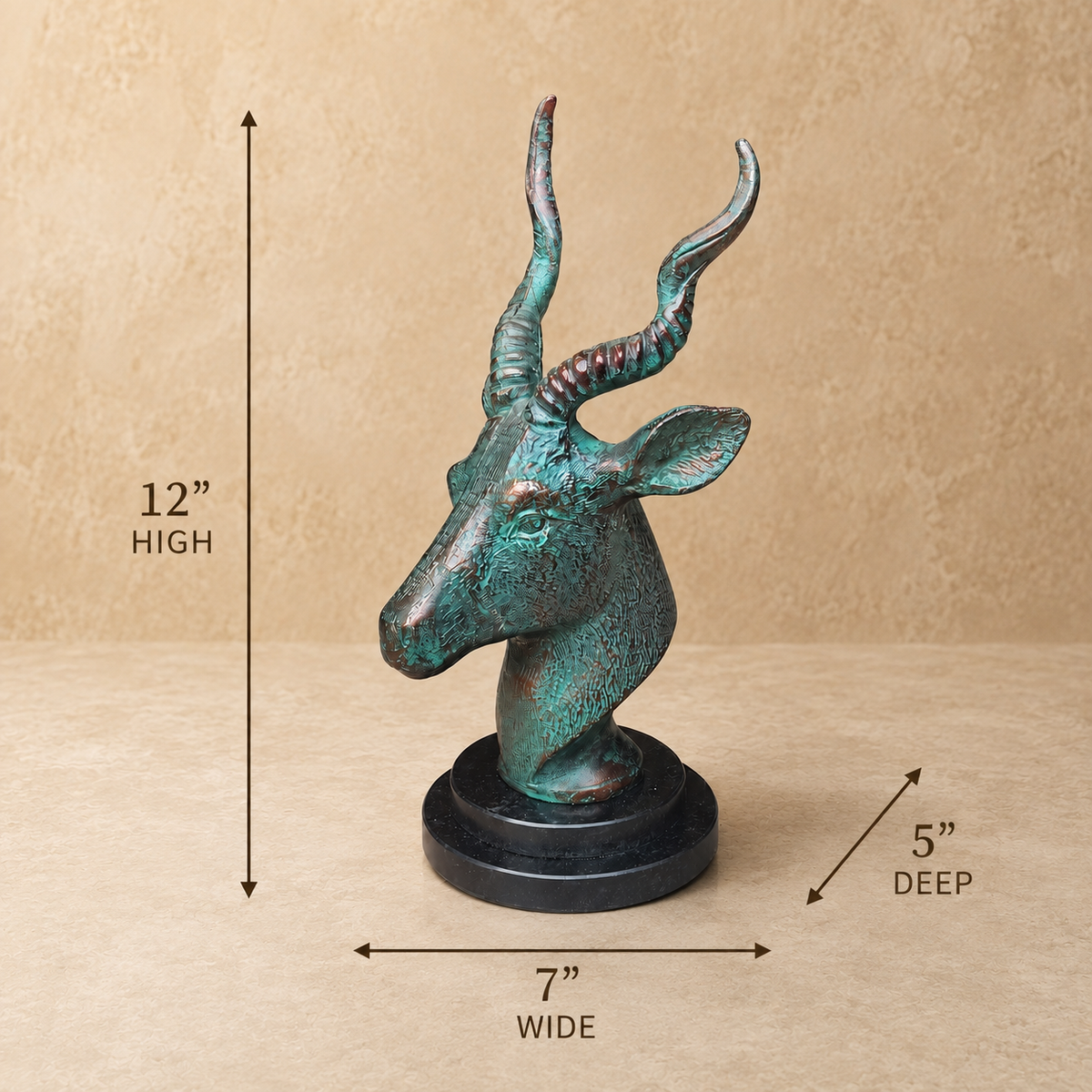 Dimension guide for antique bronze deer head sculpture showing 12-inch height, 7-inch width, and 5-inch depth on a black marble base.