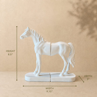 Dimension guide for white horse bookends showing 13-inch width, 6-inch height, and 4-inch depth in a luxury infographic design by Inara Home Decor.