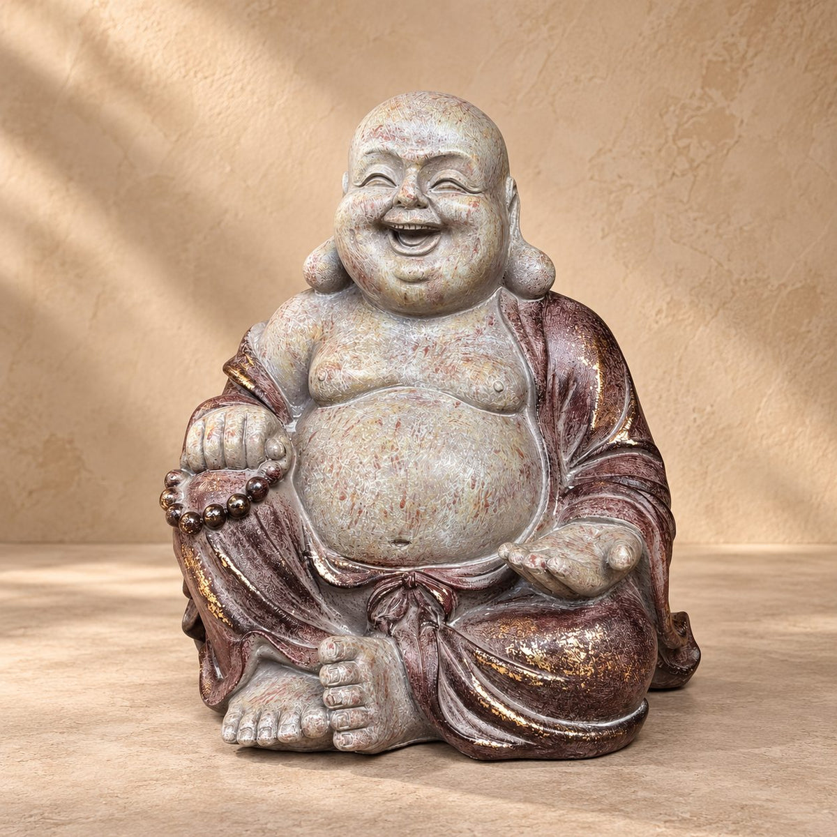 Handcrafted Laughing Buddha ceramic statue in antique cream and bronze finish, front view decorative home décor sculpture.