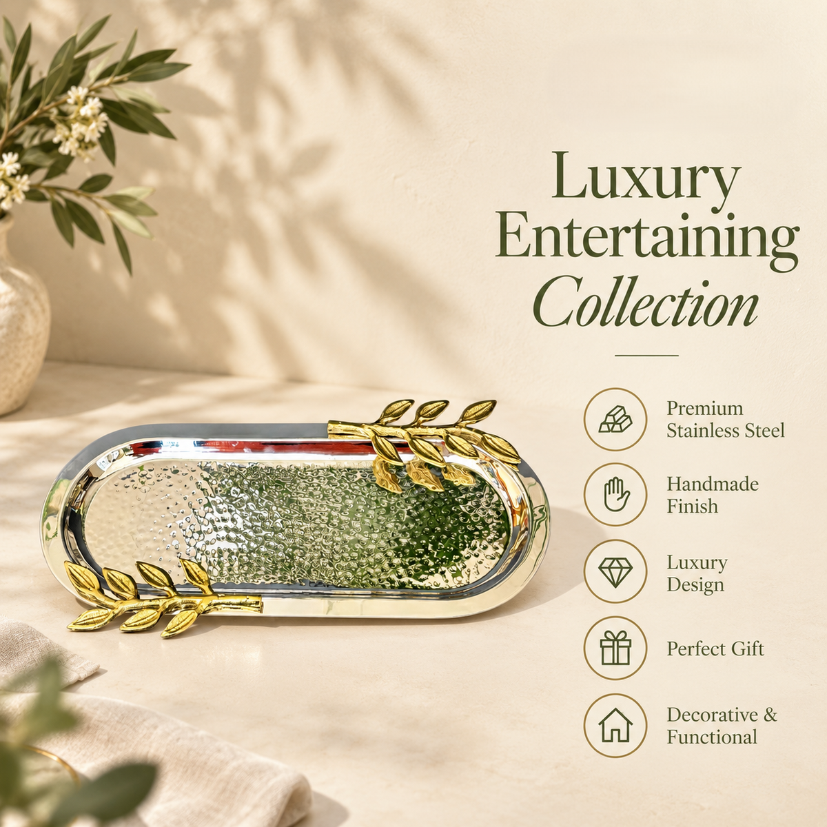 Leaf Handle Hammered Serving Tray with gold leaf handles from the Luxury Entertaining Collection, handcrafted hammered stainless steel serving tray for elegant serving, gifting, and home décor.